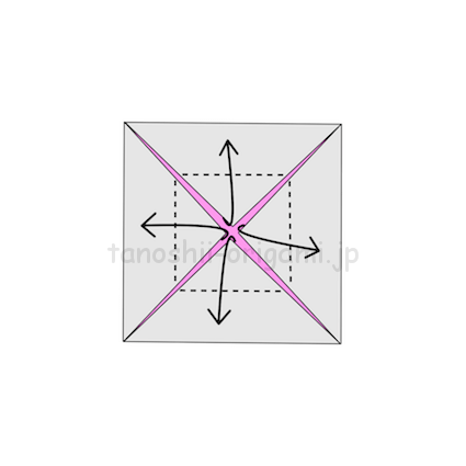6.折り線に合わせて角を真ん中から外側に折る (2)