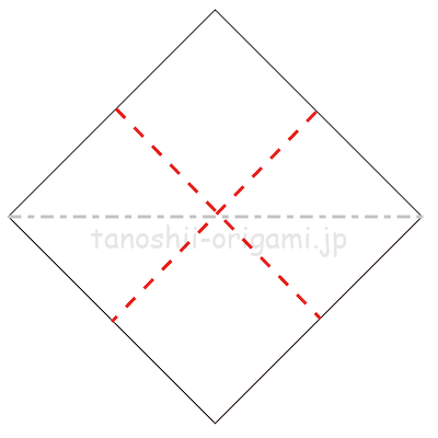 2.長方形になるように半分に折り、折り線をつける。